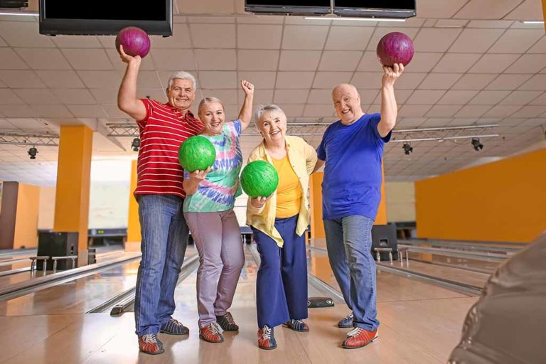 senior people in bowling club 5 Fun Indoor Activity Ideas For Seniors