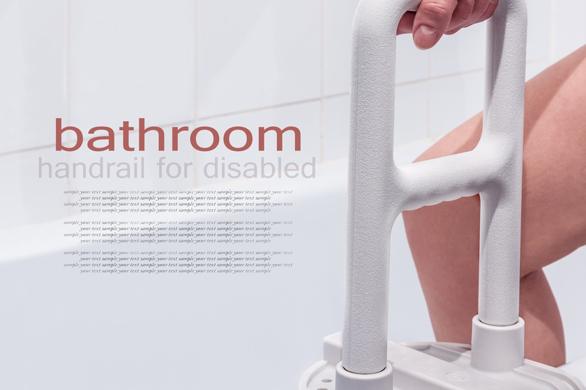 hand holding the handrail in the bathroom hand holding the handrail in the bathroom