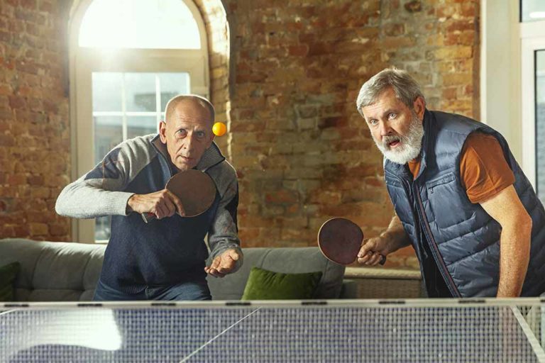 Senior men playing table tennis Fun And Useful Montessori Activities Seniors Can Do