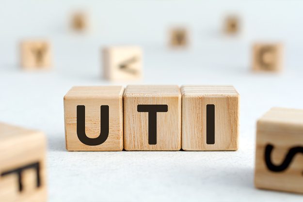 UTI – acronym from wooden blocks with letters UTI - acronym from wooden blocks with letters