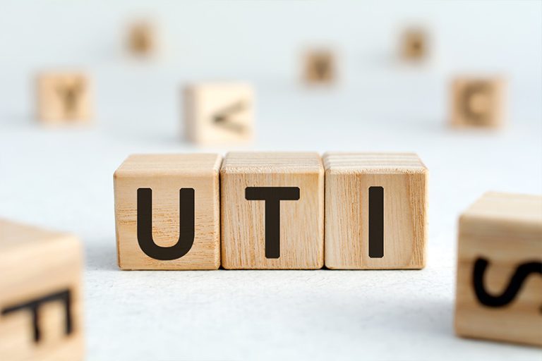 UTI – acronym from wooden blocks with letters UTI - acronym from wooden blocks with letters