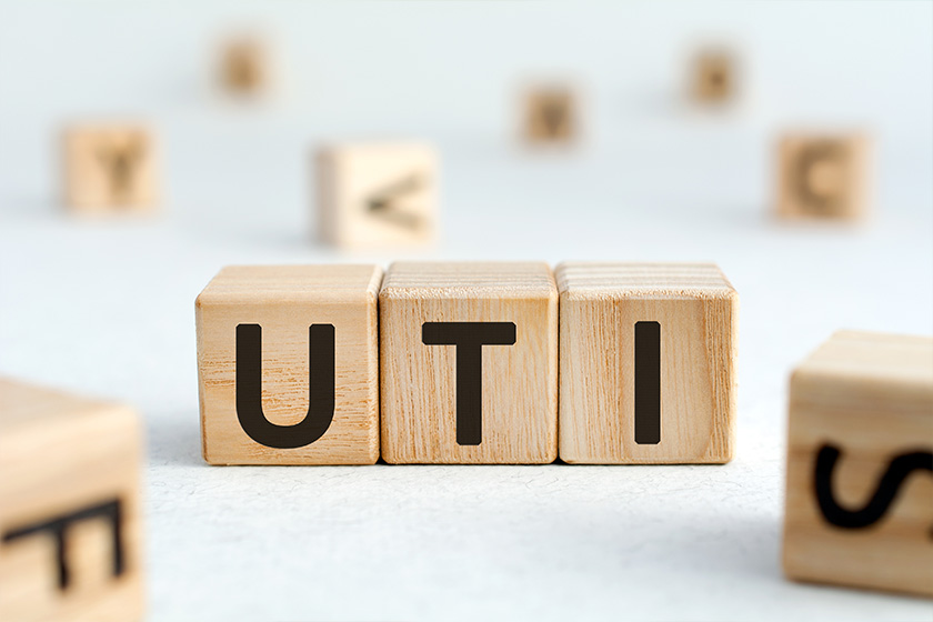 UTI – acronym from wooden blocks with letters UTI - acronym from wooden blocks with letters