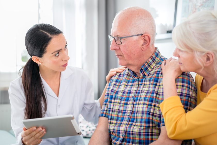 Nurse gives bad news to worried senior couple at home How Does Reminiscent Therapy For Dementia Work?