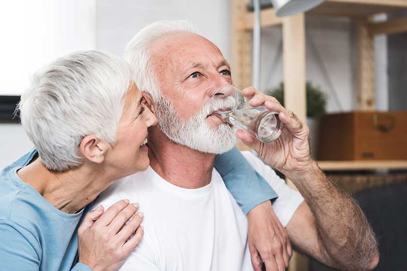 Senior couple drink water Senior couple drink water