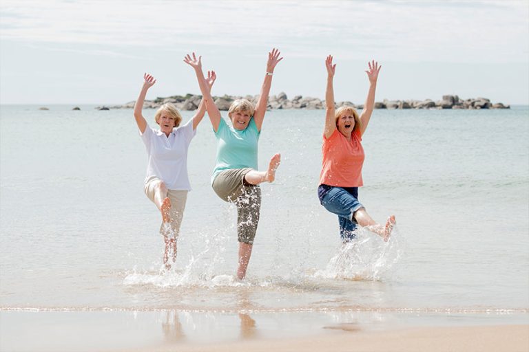 group of three senior mature retired women on their 60s having fun enjoying together group of three senior mature retired women on their 60s having fun enjoying together