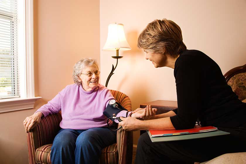 Elderly Woman Having Blood Pressure Taken