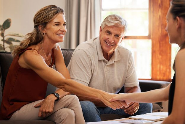 Senior Couple Handshake Finance Worker