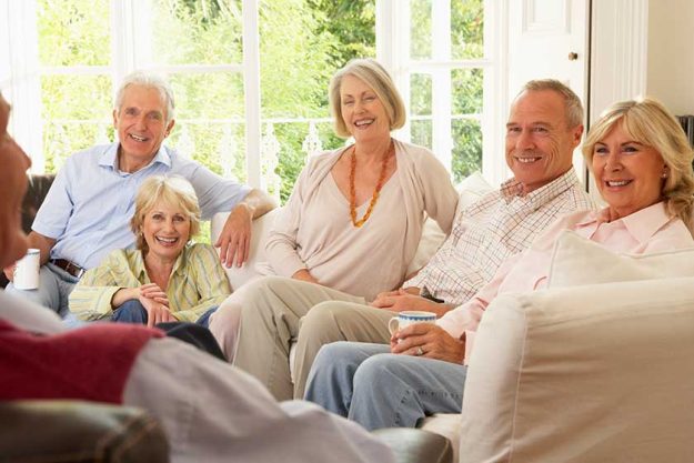 Friends Socializing At Home