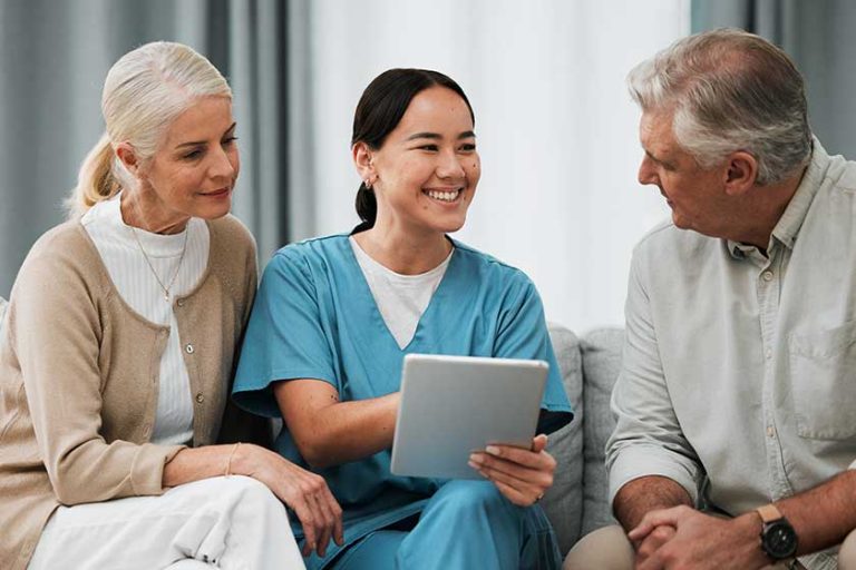 Asian nurse, senior man and woman with tablet
