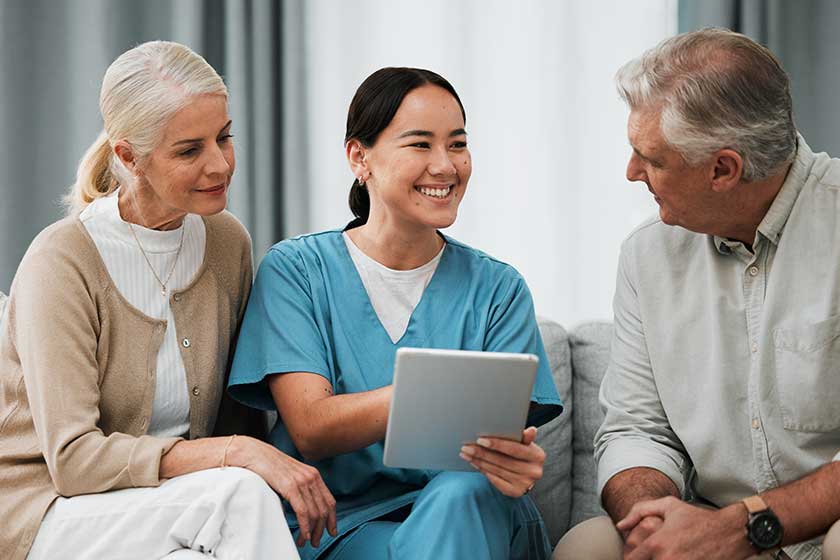 Asian nurse, senior man and woman with tablet Asian nurse, senior man and woman with tablet