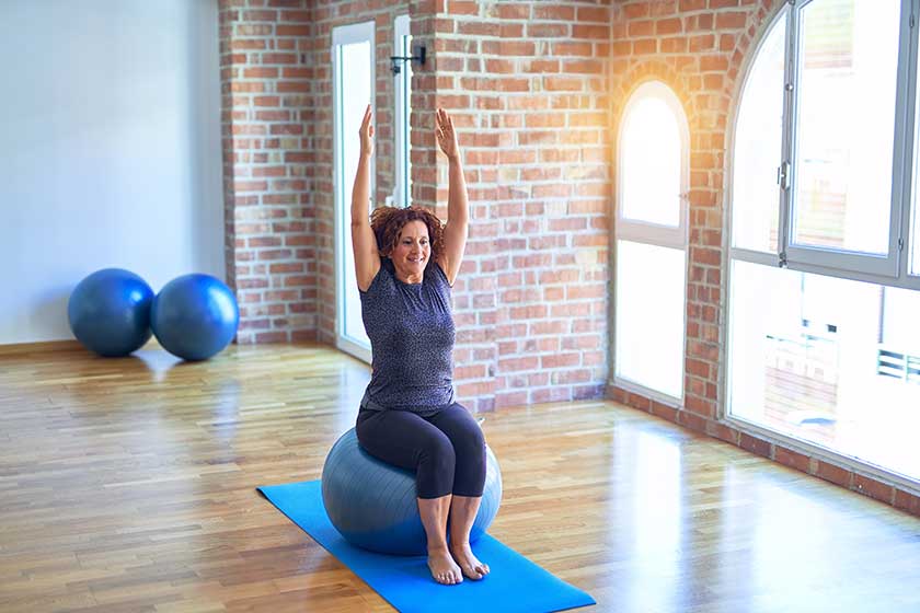 Middle age beautiful sportswoman doing exercise Middle age beautiful sportswoman doing exercise