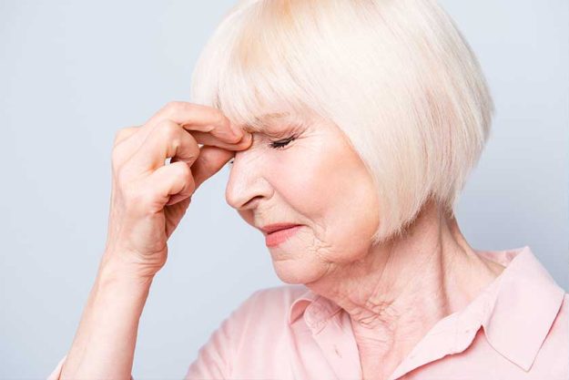 old adult caucasian lady feeling headache old adult caucasian lady feeling headache