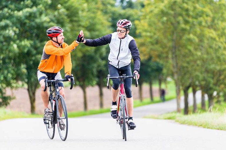 Racing cyclists after sport and fitness workout