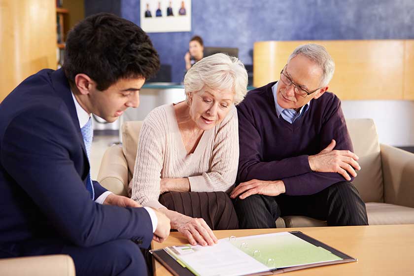 Senior Couple Meeting With Consultant