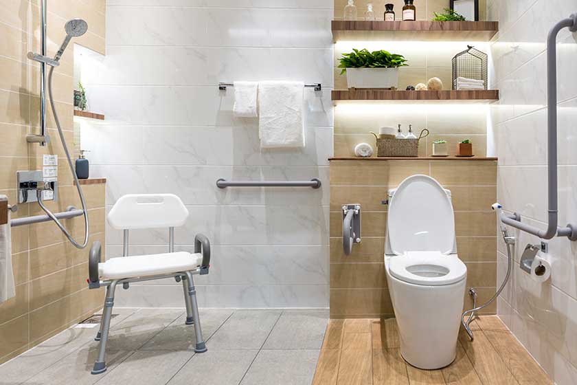 Interior of bathroom for the disabled or elderly people. Handrai