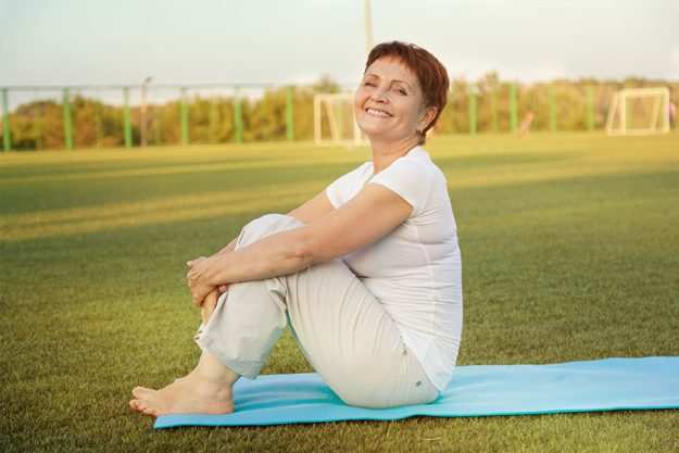 Senior woman 50 years doing fitness