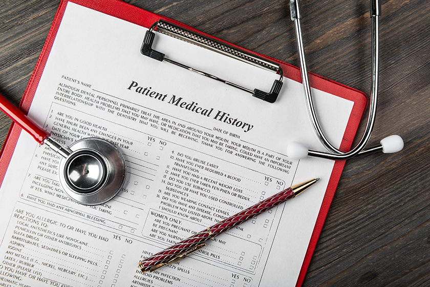 Medical history with stethoscope and pen Medical history with stethoscope and pen