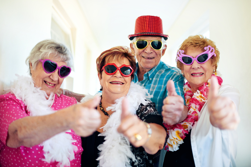 Heres to us the cool kids. a group carefree elderly people wearing sunglasses and showing thumbs up to the camera. Heres to us the cool kids. a group carefree elderly people wearing sunglasses and showing thumbs up to the camera.