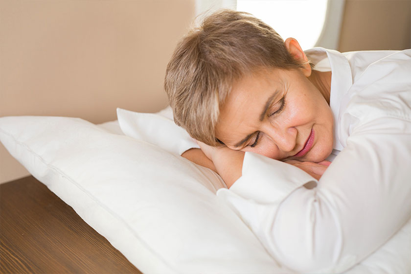 Beautiful stylish woman aged sleeping