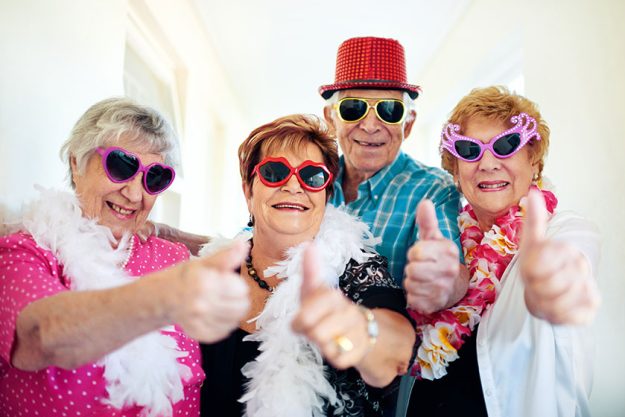 heres cool kids group carefree elderly people wearing sunglasses showing