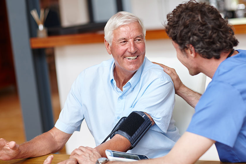 hes supportive healthcare professional doctor checking senior patients blood pressure hes supportive healthcare professional doctor checking senior patients blood pressure