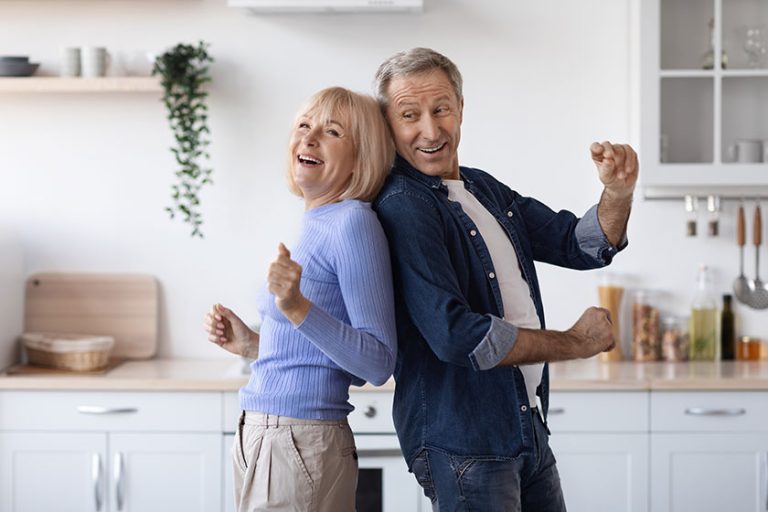 joyful elderly spouses dancing together kitchen happy attractive senior man joyful elderly spouses dancing together kitchen happy attractive senior man