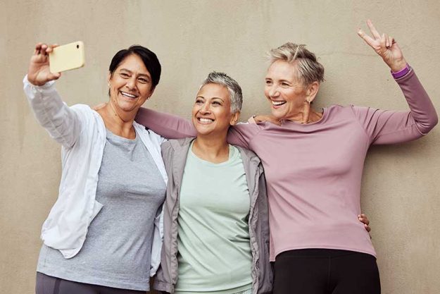 phone selfie senior women peace sign fitness exercise training workout phone selfie senior women peace sign fitness exercise training workout