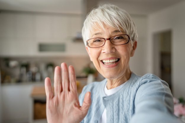 Close up portrait of one senior woman with short hair happy smil Close up portrait of one senior woman with short hair happy smil