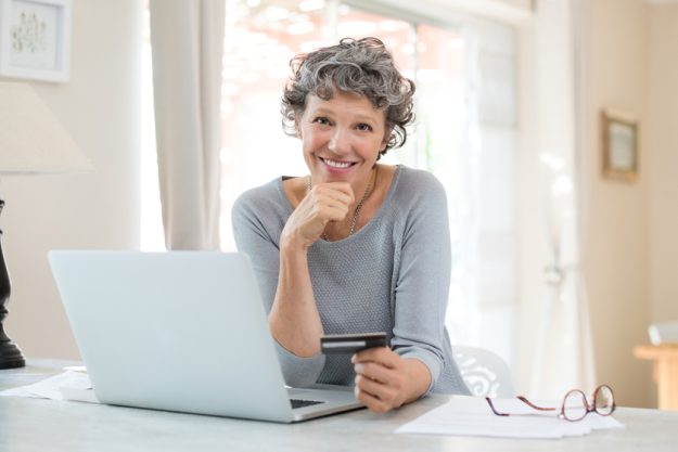 Senior woman shopping online