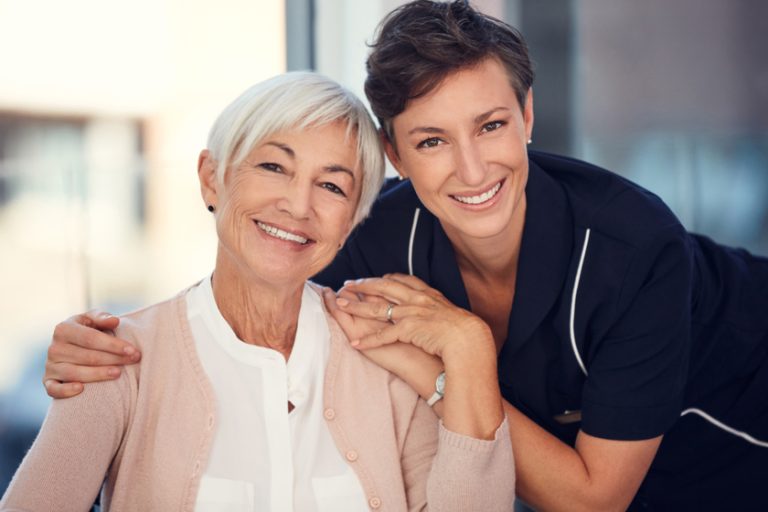 I have a pillar of strength in her. Cropped portrait of a young female nurse embracing a senior woman sitting in a wheelchair in a nursing home. I have a pillar of strength in her. Cropped portrait of a young female nurse embracing a senior woman sitting in a wheelchair in a nursing home.