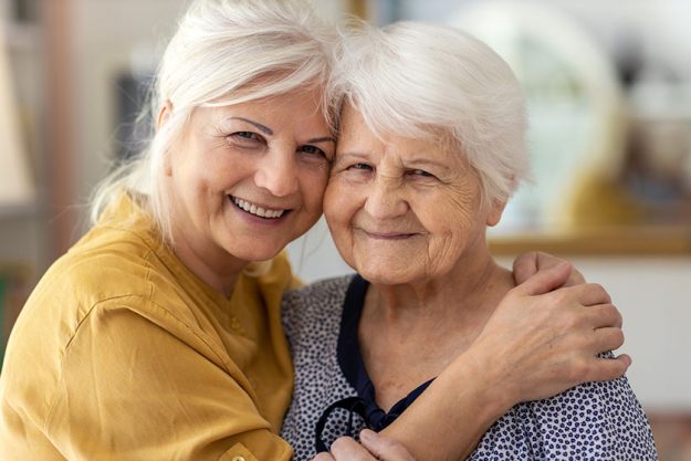 woman spending time her elderly mother woman spending time her elderly mother