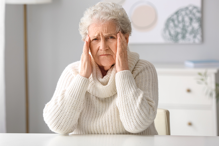 Elderly woman video chatting doctor home Elderly woman video chatting doctor home