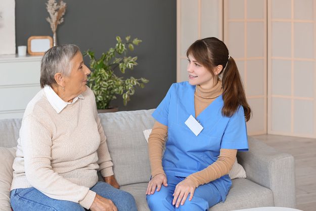 Senior woman caregiver home