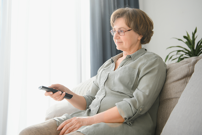 breaking news shocked senior woman watching breaking news shocked senior woman watching