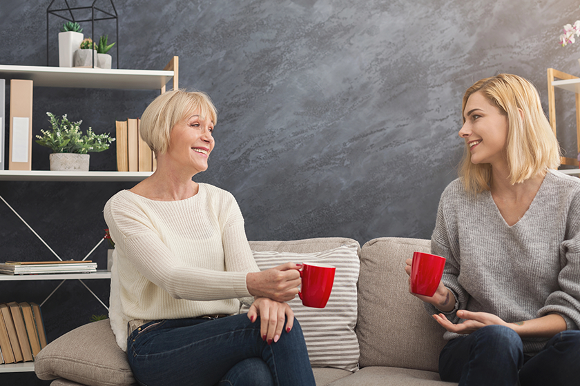 happy adult mother and daughter together