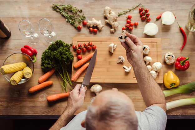 man preparing vegan food