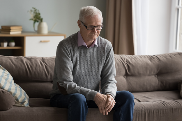 sad depressed elderly man feeling lost