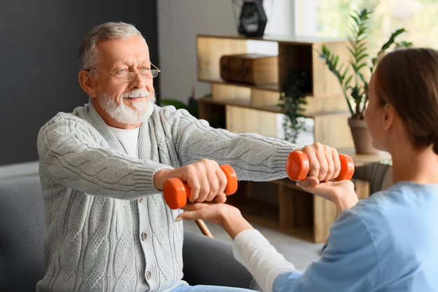 senior man dumbbells nurse training