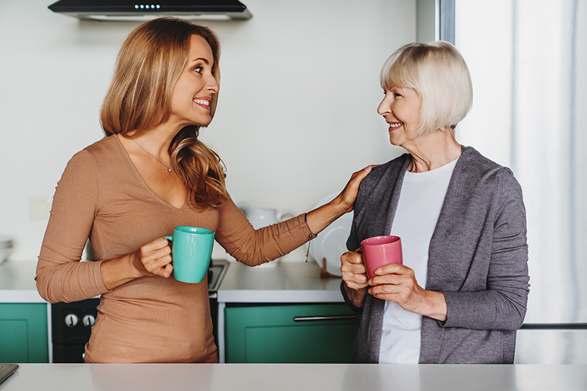 senior woman enjoying meeeting her daughter