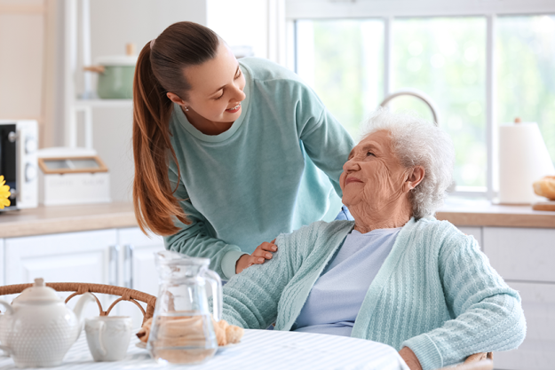 senior woman her granddaughter kitchen
