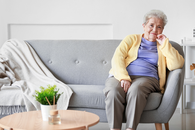 senior woman sitting sofa