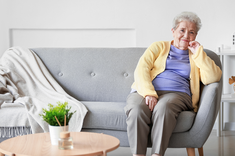 senior woman sitting sofa senior woman sitting sofa