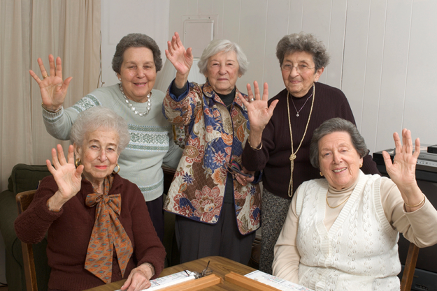 senior women at the game table