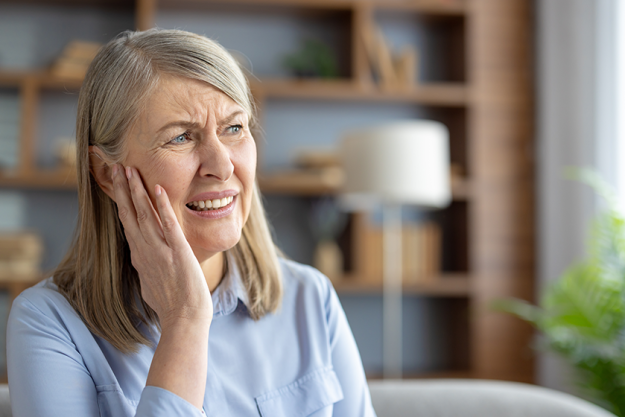 elderly caucasian woman suffering
