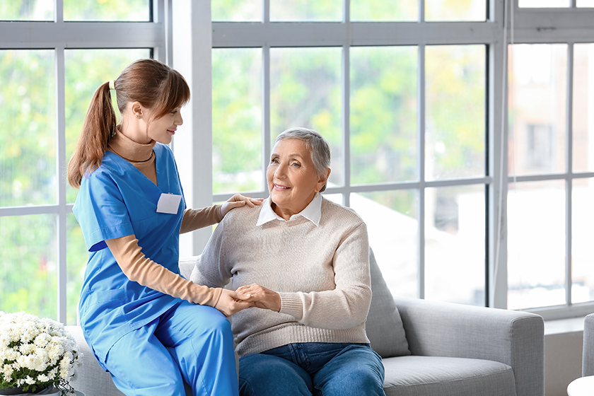 senior woman caregiver holding hands senior woman caregiver holding hands