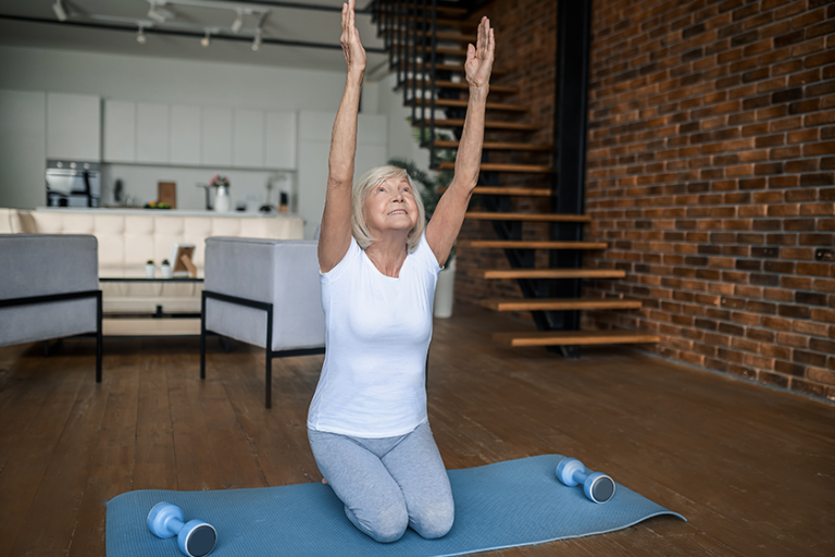 gray haired senior woman in sportswear