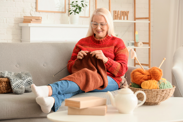mature woman knitting sweater mature woman knitting sweater