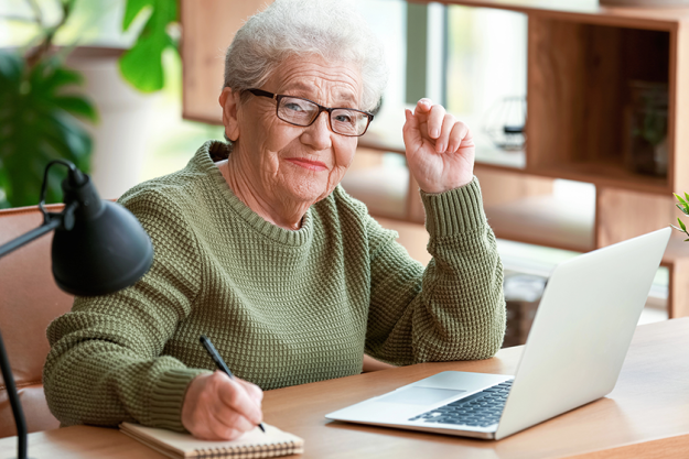 senior woman working laptop
