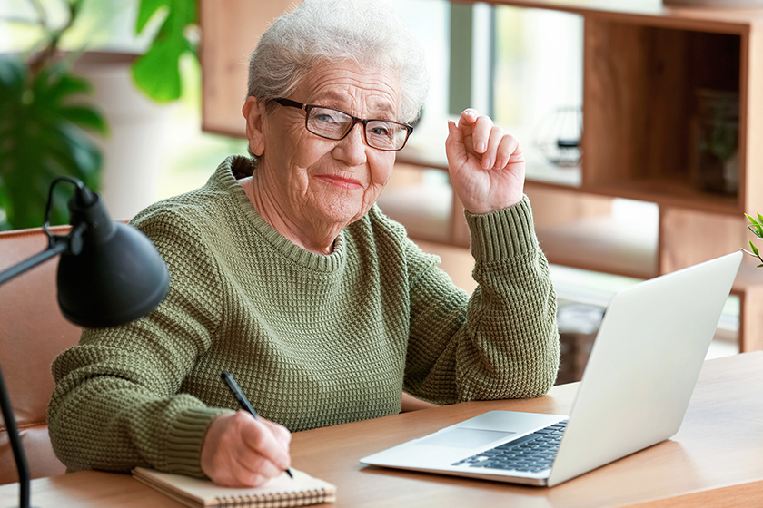 senior woman working laptop senior woman working laptop