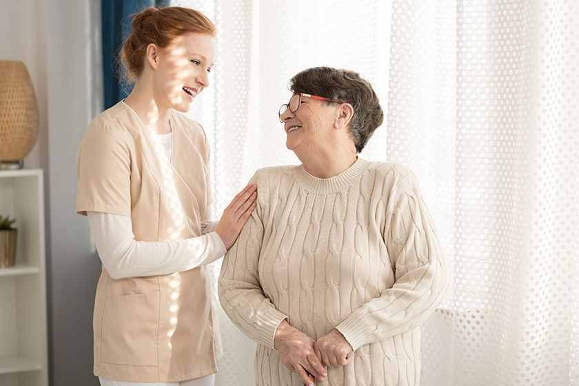smiling nurse taking care smiling nurse taking care